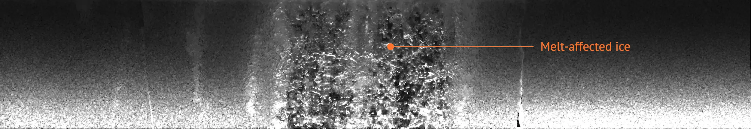 A backlit cross section of a melt-affected ice core. Credit: British Antarctic Survey