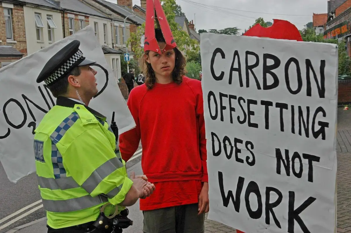 Plane Stupid campaigners protest carbon offsetting in Oxford