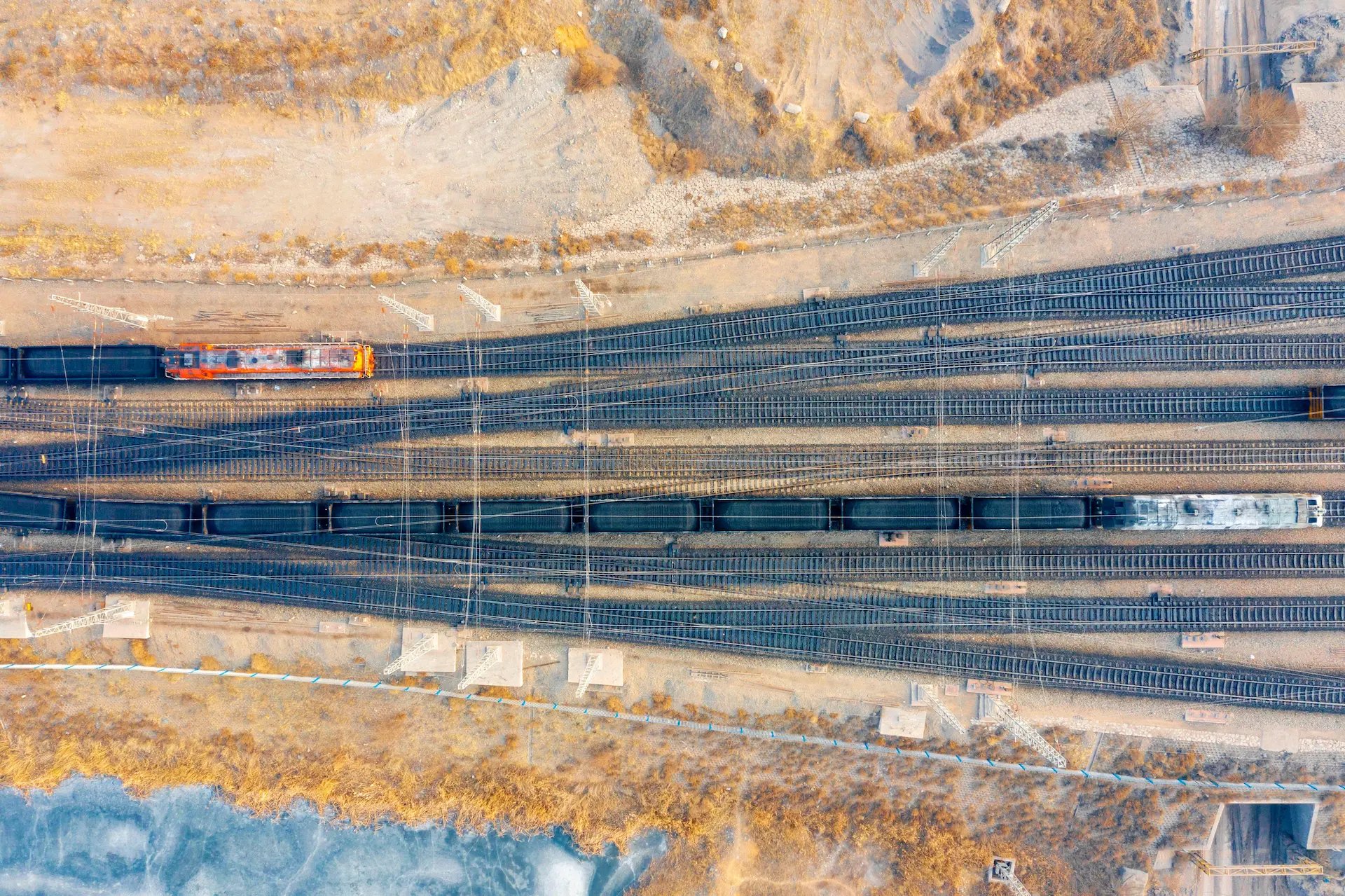 Coal trains wait to be transported at the Burtai coal mine in Inner Mongolia