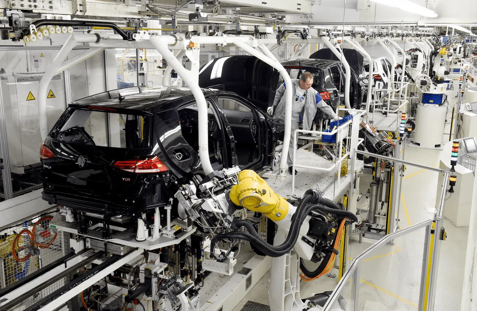 Volkswagen workers assemble cars on the company's assembly line in Wolfsburg, 2017